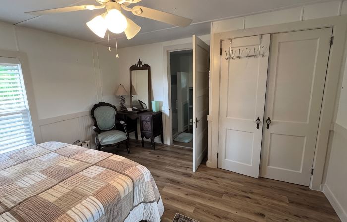 Completely renovated mobile home sitting own a pond.