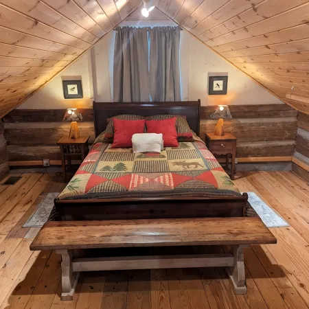 Authentic log cabin nestled in the woods by creek