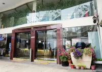 格蘭德商務酒店 鄰近那那的酒店
