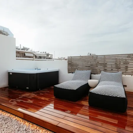 Num Suites & Lofts Athens Отели рядом с достопримечательностью «Неос-Космос»