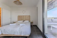 Luxury building with pond view and parking