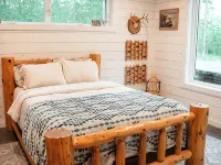 Modern mountain- inspired monoslope home located in the beautiful Northwoods Hotels in Round Lake