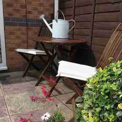 Cosy home in quiet cul-de-sac. Private fenced garden and free parking. Others