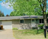 Fantastic Oasis Home in Stevens Point with fully enclosed fence for backyard!