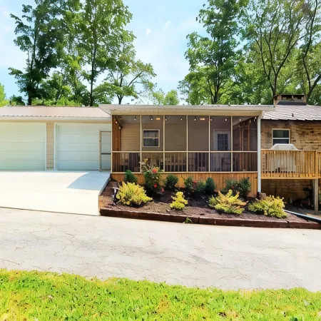 Lake Front house on Watts Bar Lake with large private dock, 2 screen porches