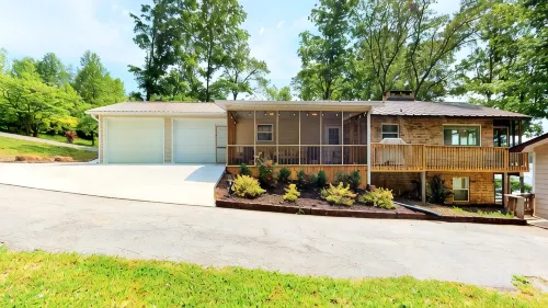 Lake Front house on Watts Bar Lake with large private dock, 2 screen porches
