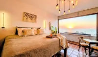 Sunset Sky Loft with Private Pool Panoramic Ocean View Steps to Camarones Beach