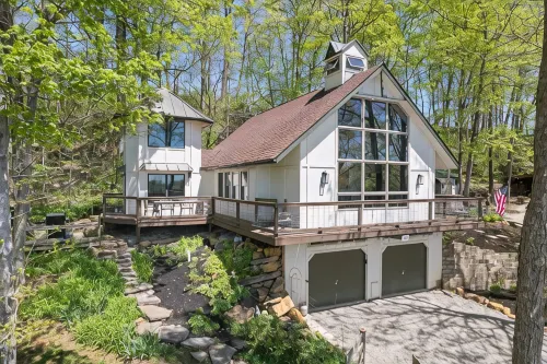 Unique and secluded A frame home on 31 acres with hot tub.