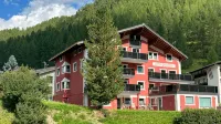 Aparthotel Grischuna - vue sur la montagne