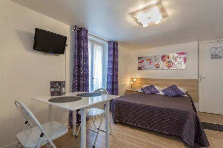 Hotel de l'Horloge Отели рядом с достопримечательностью «Кладбище Пер Лашез»