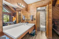 Bear Paw Cottage #5  Queen Log Bed: Cozy!: Pet Friendly; 2 Adults/2 Children Max