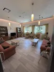 Natura Beach Hotel and Villas - bar