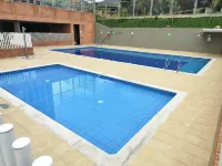 Apt in Giron, 3 blocks from the main park and 15 minutes from the airport! のホテル