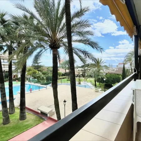Studio in front of the pool