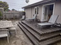 Monterey craftsman style home with vaulted exposed-beams ceiling hardwood floor
