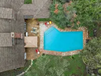 Beautiful Tudor Style home centrally located, and packed with amenities! - Pools