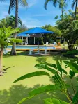 The Black Pearl Beachside Apartments - parcheggio
