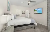 LOCATION!! Modern waterfront home;1-block to FishermanVillage; HEATED SALT POOL
