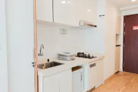 Good Choice Studio at Sky House BSD Apartment By Travelio - Pool
