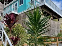 Secluded Island Escape w/ King Bed, Lush Gardens & Shared Pool Access Hotels in Coral Bay