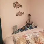 Beach Bungalow Steps from Beach! <br>TX Registration#305170 - balcony