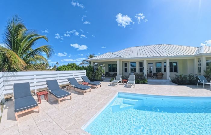Newly Remodeled Home with Pool on the Harbor with a Beach view an a 22x40 dock.