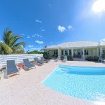 Newly Remodeled Home with Pool on the Harbor with a Beach view an a 22x40 dock. - 4-Star