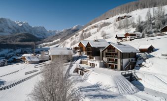 Les Dolomites Mountain Lodges