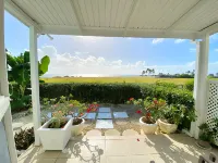 The Gem is Located a Few Minutes Walk to the Gorgeous Bottom Bay Beach
