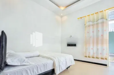 Griya Rahayu Guesthouse Mitra RedDoorz Near Jatim Park 2 Batu Hotel a Batu Sub-District