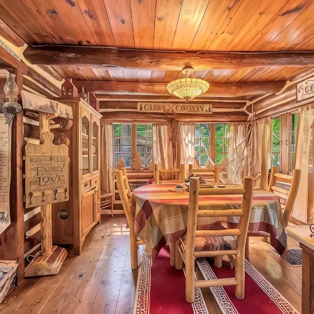 Rustic Rest Log Cabin, with hot tub and trout stream, near Poconos attractions.