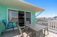 Top-Floor Canal View Condo w/ Pool, Steps to Beach - 4-Star