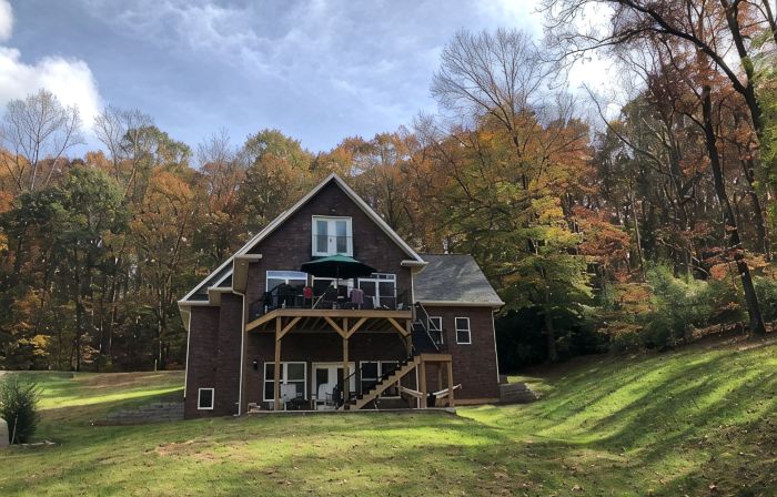 Lakefront Custom Home /w Private Dock on Cove.  Finished Basement.  2 Kitchens