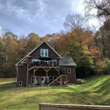 Lakefront Custom Home /w Private Dock on Cove.  Finished Basement.  2 Kitchens
