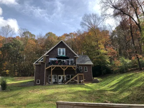 Lakefront Custom Home /w Private Dock on Cove.  Finished Basement.  2 Kitchens
