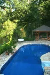 Riverfront, golf course retreat with pool!