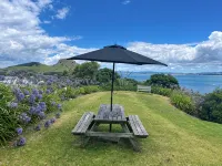 Classic Kiwi Bach In Blissful Urquhart Bay - Relax and Recharge - salle de sport