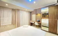 Minimalist 1Br at Gateway Pasteur Apartment by Travelio - Bungalows