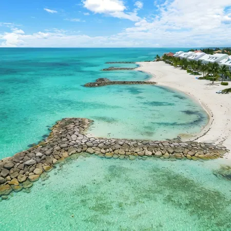 Luxury Beach side escape, steps from private beach, restaurant, marina, and café