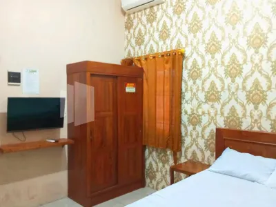 Isa Homestay Kudus Mitra Reddoorz 마용 호텔