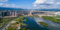 Xinkaitong Hotel Ruili - Bergblick