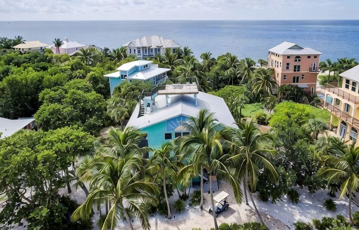 Private Beach Access Steps Away,  Pool, Outdoor Bar, 2 Golf Carts, 360 Views.