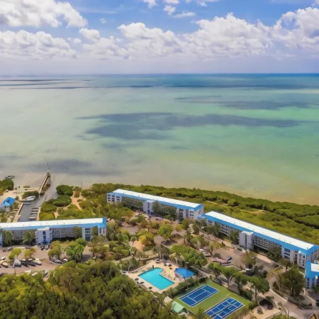 Chic Coastal Retreat with Pool, Marina, Beach Access & Resort-Style Amenities