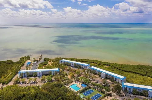 Chic Coastal Retreat with Pool, Marina, Beach Access & Resort-Style Amenities