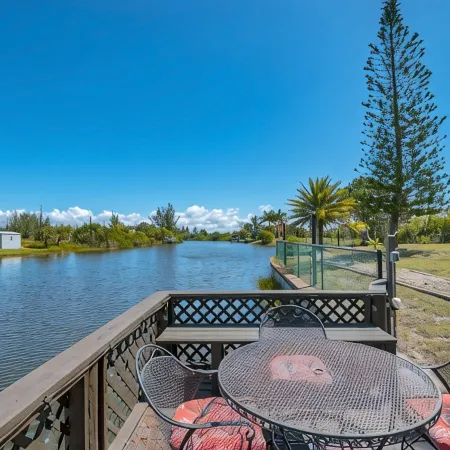 LUXURY WATERFRONT! WARM PRIVATE POOL! MIN TO BEACHES! WIFI! GRILL! BABY SUPPLIES
