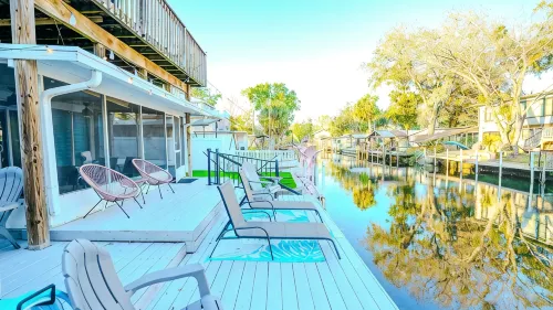 River Home with Huge Arcade, Hot Tub, Kayaks, Mini Golf Course, 80in TV - Boutique