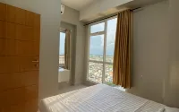 Apartemen VidaView by RoomForRent - balcony