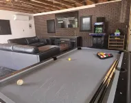 This house is located on North Webster Lake and features a hot tub. - Gym