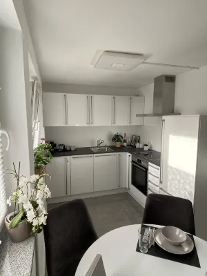 New vacation apartment in a top location - close to the lake and quiet - Homestays