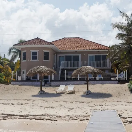 Coco Kai Beach Front Villa with Heated Pool and Private Dock